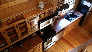 View of kitchen from loft. 