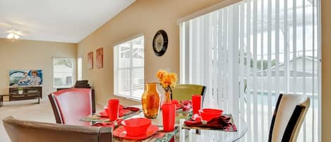 Open design - Family room and breakfast area with view of the private pool