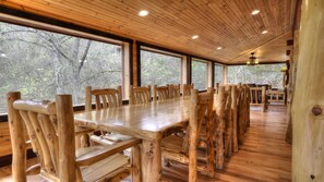to this-dining area with table seating 14
