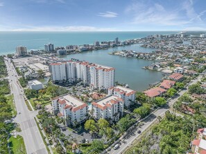 The condo is located less than 2 blocks from Vanderbilt Beach.