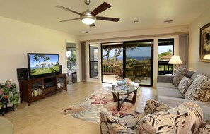 Living room with 65" Smart TV and Sony/JBL sound system