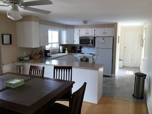 Full size kitchen with tile floor