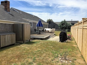 Back yard with outdoor shower and 12'x 26' deck