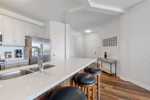 Kitchen and front entrance way