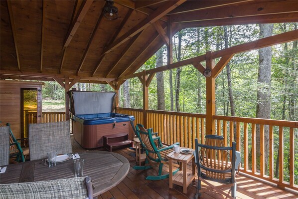 The Covered Rear Deck Awaits With Activities and Relaxation
