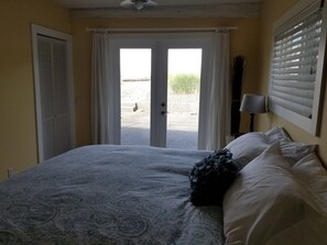 Doors open up to patio and beach
