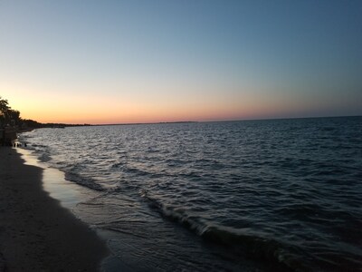 Quaint beach cottage with magnificent sunrises on Saginaw Bay/Lake Huron