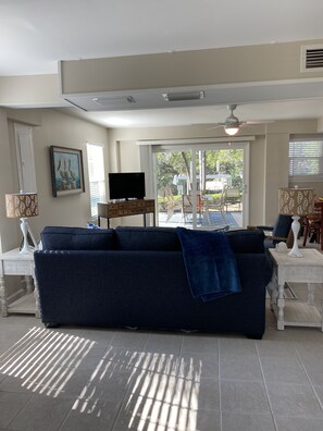 View to the lanai and pool area from front door