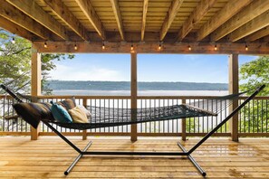Relax on the lower deck in our hammock overlooking the lake.