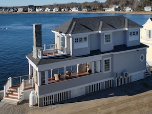 The Boathouse is west facing and is perched directly alongside the water.