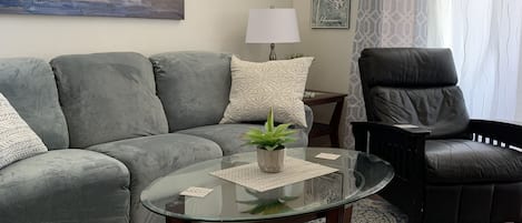 Comfortable living area with beautiful lighting! 