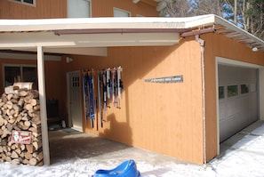 Entryway to Crossett Hill Lodge - guests may use the skis and snowshoes!