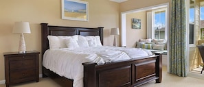 Master Bedroom.  Window seat and private lanai with a view of the pool.