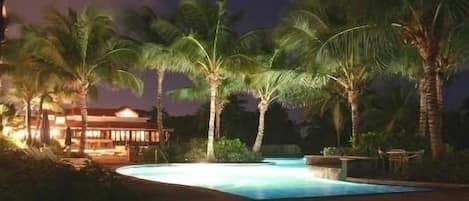 Night view of 1 of our private Villa pools ; ocean just to the right