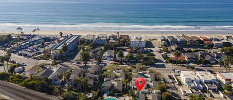 Located in prestigious Del Mar Beach Colony across the street from the beach