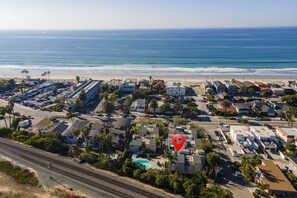 Located in prestigious Del Mar Beach Colony across the street from the beach