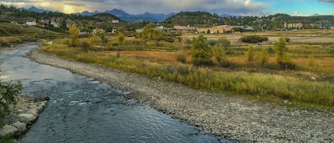 An incredible view of the river, downtown and the mountains ALL from the deck!