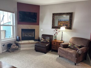 Living area with gas fireplace.
