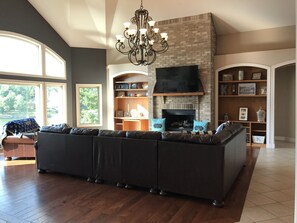 vaulted great room with fireplace 