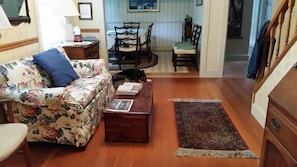 Part of living room with view of dining room