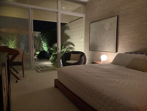 Guest bedroom with courtyard beyond