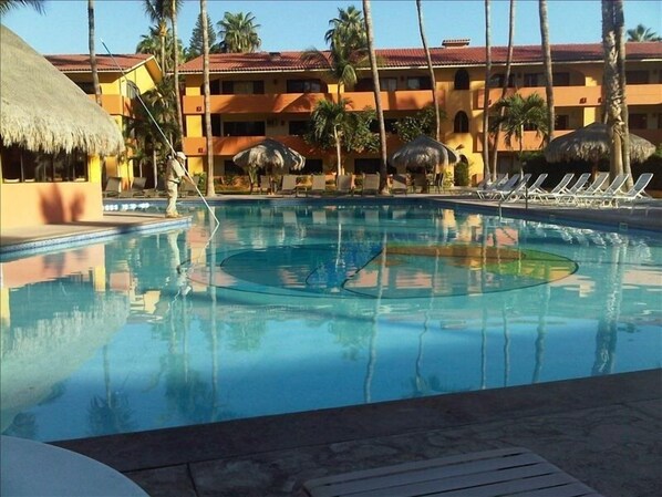 Quiet & peaceful Oasis pool with bar/restaurant service and happy hour.