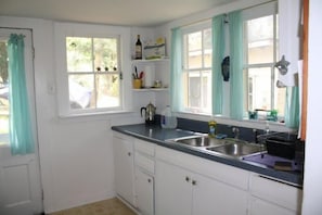 kitchen- receives good daylight with all of the windows.