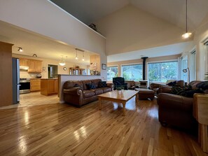 Stunning and spacious living room with flat screen TV. 