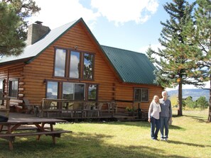 The north side of the cabin which faces the San Juan Mtn. range. Love the deck!!