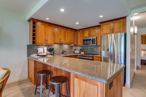 Well equipped kitchen, granite counter tops. Nice big food-prep area.