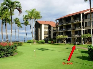 View of groundfloor Papakea Unit G-106 from golf putting green
