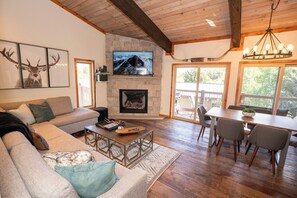 Main Room with gas fireplace and 65 inch TV