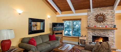 High Cathedral Ceilings With Plenty Of Natural Light.  Comfy entertainment area.