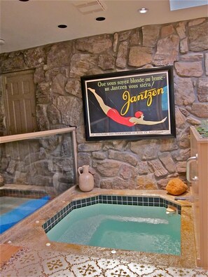 Master Bathroom with rock walled sunken Jacuzzi tub