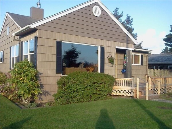 Warm, sunny deck at front of house.