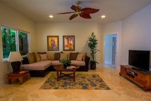 Cozy living area with large flatscreen TV