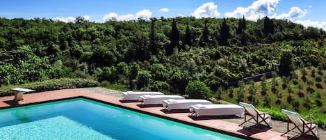 Private swimming pool with breathtaking views over the typical Tuscan landscape