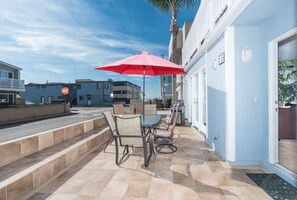 Ocean view from the coveted 34th Street front patio, two houses back from beachfront and boardwalk; includes outdoor dining, propane bbq grill, market umbrella.
                