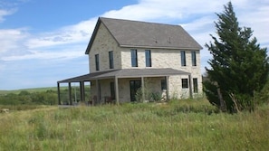 True Prairie Home with porches on all four sides of the house