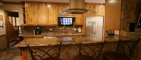 Beautiful chef’s kitchen fully equipped. High end appliances and granite slab