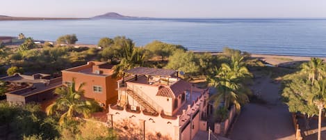 Villa is on the right. Path to the beach is visible 