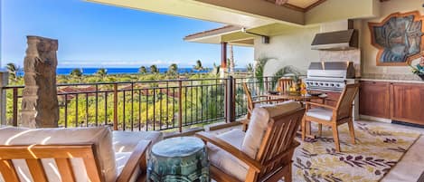 Ocean & Sunset Views from the Generous Lanai with Plush Chairs, Dining Area & BBQ Grill.