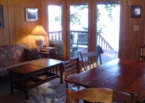 Partial view of the common room and first floor porch looking toward the lake