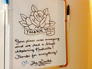 Drawing and message left on white board from very talented guests