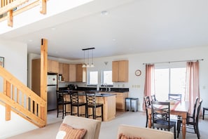 Open floor plan living room and kitchen, a perfect place to gather. 