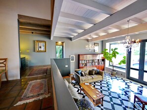 Above living room with pool on far right. Many books on many subjects.