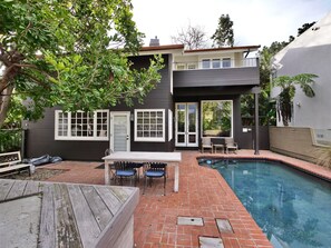 master balcony top right. Living room below by pool. study above table.