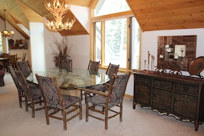 Dining Area seats eight guests with antler chandelier