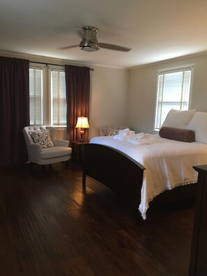 Master Bedroom with Queen Bed and Sitting Area, plus Fireplace Insert