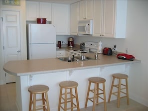 Fully equipped kitchen has 7 barstools, pantry and lots of electric gadgets!